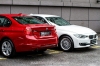 Front view of BMW 320i Luxury and back view of BMW 320i Sport
