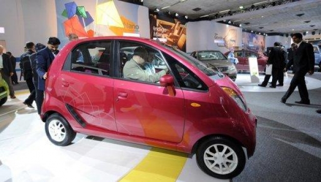 Visitors inspect Tata Motor's Nano in New Delhi Visitors inspect Tata Motor's Nano in New Delhi
