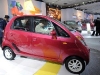 Visitors inspect Tata Motor's Nano in New Delhi