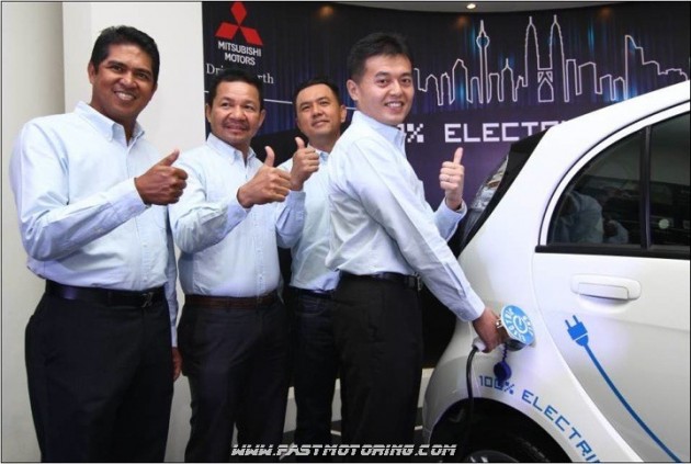 From L-R Directors of SAG Star (Chan Sow Lin) Mr. Adam Khan, En. Zulkifli, Mr. Justin See and CEO of MMM Mr. Tetsuya Oda charging the i-MiEV during the official launch