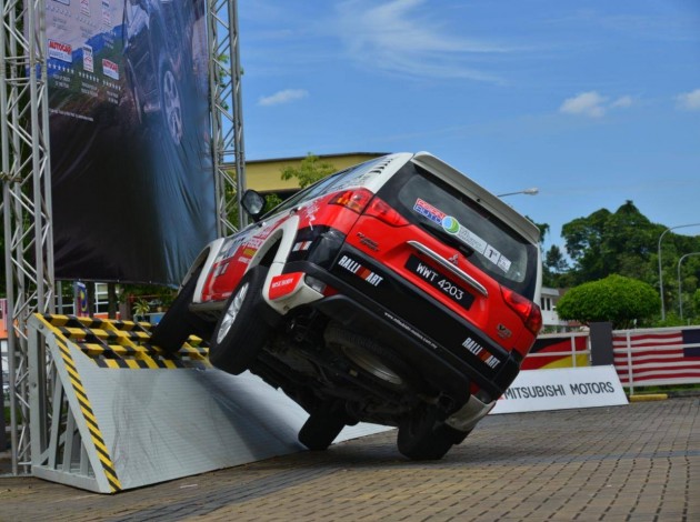 Pajero Sport through an obstacle ride