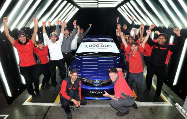 Toyota workers celebrate production of the three-millionth Toyota in Australia, a Camry Hybrid (Camry hL model shown)