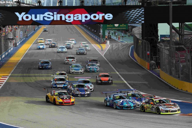 Craig Baird (NZL) Clearwater Racing and Rodolfo Avila (MAC) Team Jebsen battle for position at the start of the race at Porsche Carrera Cup Asia, Rds 11&12, Marina Bay Circuit, Singapore, 18-20 September 2015.