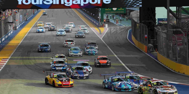 Craig Baird (NZL) Clearwater Racing and Rodolfo Avila (MAC) Team Jebsen battle for position at the start of the race at Porsche Carrera Cup Asia, Rds 11&12, Marina Bay Circuit, Singapore, 18-20 September 2015.